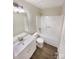 Clean bathroom with a single vanity, mirror, and a shower-tub combination at 2512 Captains Watch Ne Rd, Kannapolis, NC 28083