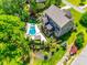Beautiful aerial view of property featuring a pool, jacuzzi, landscaping, and home at 288 Ridge Reserve Dr, Lake Wylie, SC 29710