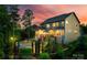 An elegant backyard featuring a pool, covered patio, and lush landscaping, ideal for entertaining at 288 Ridge Reserve Dr, Lake Wylie, SC 29710