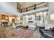 Spacious living room showcasing an open layout, high ceilings, and a view of the modern kitchen at 288 Ridge Reserve Dr, Lake Wylie, SC 29710