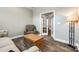 Cozy living room with natural light, comfortable seating, and french doors at 288 Ridge Reserve Dr, Lake Wylie, SC 29710