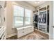 Walk-in closet with custom shelving, and a seating area at 288 Ridge Reserve Dr, Lake Wylie, SC 29710