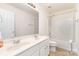 Bathroom with double sinks, neutral walls and floor, and combined shower and tub at 3005 Sandbox Cir, Indian Trail, NC 28079