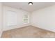 Neutral bedroom features carpet, light walls and trim, and bright, natural light at 3005 Sandbox Cir, Indian Trail, NC 28079