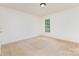 Neutral bedroom features carpet, light walls and trim, and bright, natural light at 3005 Sandbox Cir, Indian Trail, NC 28079