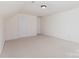 Upstairs bedroom features carpet, light walls and trim, and bright, natural light at 3005 Sandbox Cir, Indian Trail, NC 28079