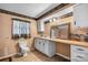 Modest bathroom with toilet, vanity, and window at 3265 W Innes St, Salisbury, NC 28144