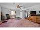 Spacious bedroom with ceiling fan, window, and access to the rest of the house at 3265 W Innes St, Salisbury, NC 28144