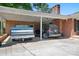 Spacious covered carport showcasing ample parking space for multiple vehicles, offering protection from the elements at 3265 W Innes St, Salisbury, NC 28144