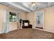 Living room boasts natural light from window and an open doorway at 3265 W Innes St, Salisbury, NC 28144
