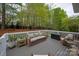 Relaxing outdoor deck with comfortable seating area, perfect for entertaining and enjoying the backyard at 4027 Wallbrook Dr, Matthews, NC 28105