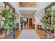 Grand foyer with high ceilings, hardwood floors, elegant staircase, and open view to living spaces at 4027 Wallbrook Dr, Matthews, NC 28105