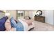 Comfortable main bedroom with a plush bed, a window and tasteful furnishings at 4372 Bronze Blvd, Sherrills Ford, NC 28673