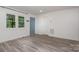 Open concept living room with clean modern floors and neutral colors at 500 3Rd St, Stanley, NC 28164