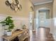 Charming foyer with hardwood floors, wainscoting, and a decorative accent table at 505 Chamberlain Ct, Mcadenville, NC 28101