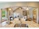 Kitchen view showcasing granite countertops and open flow into living and dining areas at 505 Chamberlain Ct, Mcadenville, NC 28101