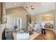 Spacious living area with vaulted ceiling, fireplace, and seamless transition to dining area at 505 Chamberlain Ct, Mcadenville, NC 28101