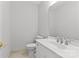 Bathroom featuring white fixtures, vanity with sink, and tile flooring at 5306 Sandtrap Ln, Charlotte, NC 28226