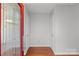 Bright entryway featuring hardwood floors and a stylish glass-paneled front door at 5306 Sandtrap Ln, Charlotte, NC 28226