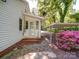 Shows the home's back entrance with a covered landing and a carport at 610 N Pine Ln, Wadesboro, NC 28170
