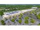 Aerial view of commercial area with large shopping center with solar panels and parking at 6101 Park Hill Rd, Charlotte, NC 28277