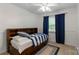 This bedroom has a built-in headboard and under-bed storage, providing both style and practicality at 6101 Park Hill Rd, Charlotte, NC 28277