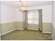 Cozy dining room with carpet and a chandelier at 625 Court Side Dr, Salisbury, NC 28147