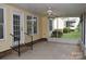 Spacious screened-in porch with access to both the backyard and the interior of the home at 625 Court Side Dr, Salisbury, NC 28147
