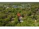 A wooded home is near a lake and golf course, offering a scenic and convenient location at 7912 Baltusrol Ln, Charlotte, NC 28210
