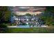 Luxury backyard with a pool, lounge chairs, and a covered patio, perfect for outdoor entertaining at 7912 Baltusrol Ln, Charlotte, NC 28210