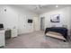 Spacious bedroom with plush carpet, desk and large window at 7912 Baltusrol Ln, Charlotte, NC 28210