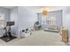 Spacious bedroom features a window, Peloton, and decor appropriate for a  at 8429 Golden Stone Ln, Fort Mill, SC 29707
