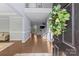 Open foyer with hardwood floors, soaring ceilings, and an inviting view into the living spaces at 8429 Golden Stone Ln, Fort Mill, SC 29707