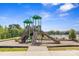 Community playground with slides, climbing features, and safe play surfaces for children at 8429 Golden Stone Ln, Fort Mill, SC 29707