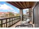 Inviting balcony with seating offers an open view of the surrounding neighborhood at 9029 J M Keynes Dr # 63, Charlotte, NC 28262
