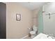 Compact bathroom featuring a glass shower stall and modern vanity at 9029 J M Keynes Dr # 63, Charlotte, NC 28262
