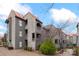 Attractive multi-story building with unique architectural details and mature landscaping at 9029 J M Keynes Dr # 63, Charlotte, NC 28262