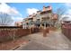 Exterior of a charming complex featuring landscaped grounds, and multi-story buildings at 9029 J M Keynes Dr # 63, Charlotte, NC 28262