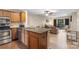 Updated kitchen and living area with granite countertops and stainless steel appliances at 9029 J M Keynes Dr # 63, Charlotte, NC 28262