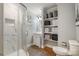 Beautifully designed bathroom with a stand up shower and lots of shelves for storage at 907 E 9Th Ave, Gastonia, NC 28054