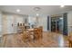 Dining area features wood floors, natural light and adjacent access to the kitchen at 907 E 9Th Ave, Gastonia, NC 28054