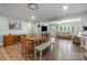 Open-concept living space featuring hardwood floors and plenty of natural light at 907 E 9Th Ave, Gastonia, NC 28054