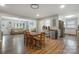 Spacious open-concept living space with hardwood floors and a dining area at 907 E 9Th Ave, Gastonia, NC 28054