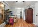 Mud room area that includes a laundry area and features wood look flooring at 907 E 9Th Ave, Gastonia, NC 28054