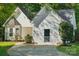 White siding house with a driveway, front yard, and landscaping at 9200 Forest Green Dr, Charlotte, NC 28227
