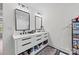 Bathroom features a dual sink vanity with modern faucets and hardware at 1009 Rainbow Cir, Catawba, SC 29704