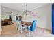 Dining area featuring modern lighting fixture and view into living area at 1009 Rainbow Cir, Catawba, SC 29704