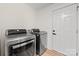 Modern laundry room featuring LG washer and dryer units, and a white door at 1009 Rainbow Cir, Catawba, SC 29704