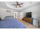 Spacious main bedroom boasts tray ceiling, generous closet space, and modern barn door at 1009 Rainbow Cir, Catawba, SC 29704