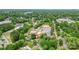An aerial view reveals a home in a neighborhood setting near commercial areas and roads at 105 N Baldwin Ave, Kannapolis, NC 28083